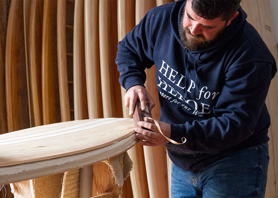 Otter wooden surfboard workshop planing shaping