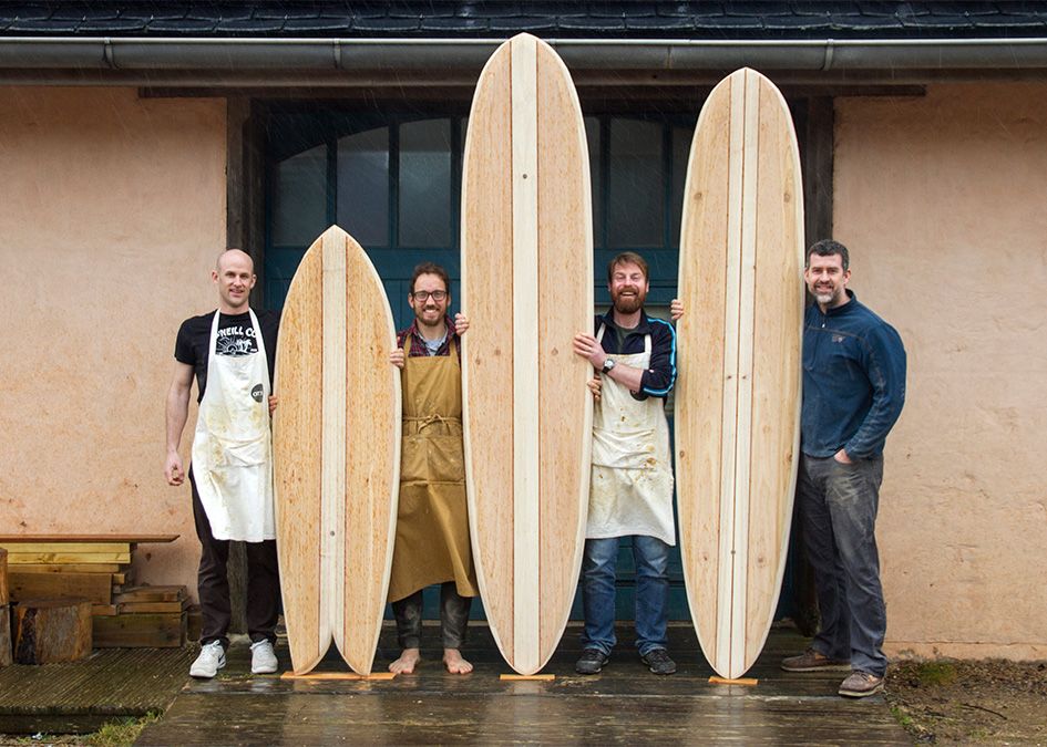 Otter wooden surfboard workshop blue doors