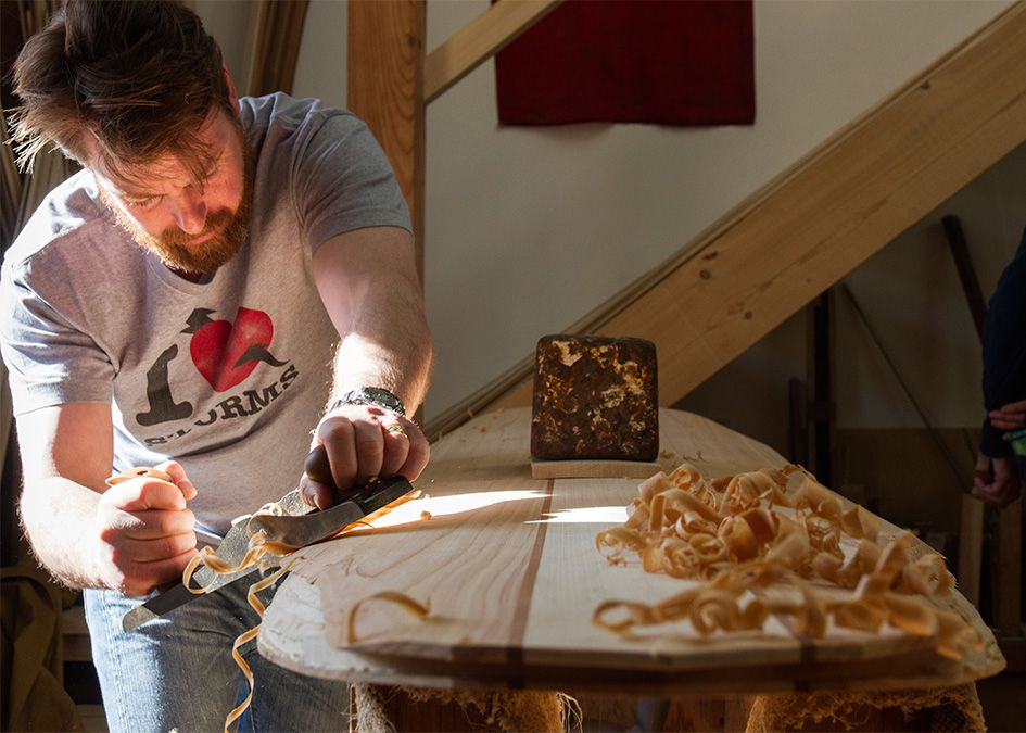 Otter wooden surfboard workshop shaping