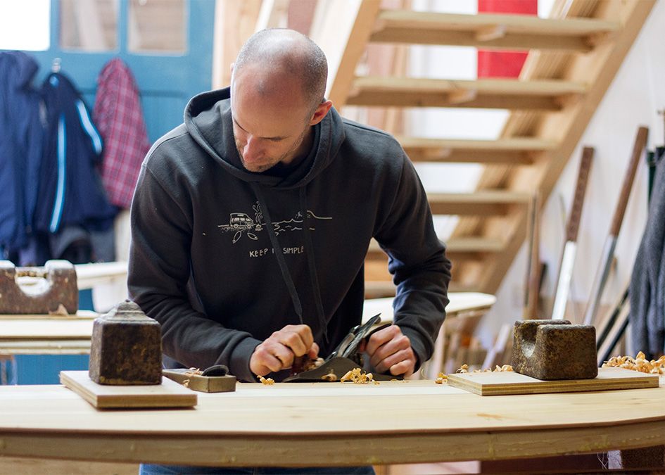 Otter wooden surfboard workshop shaping