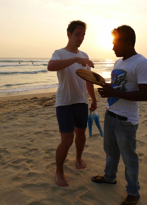 otter surfboards wooden bodysrufing handplane on beach in sri lanka