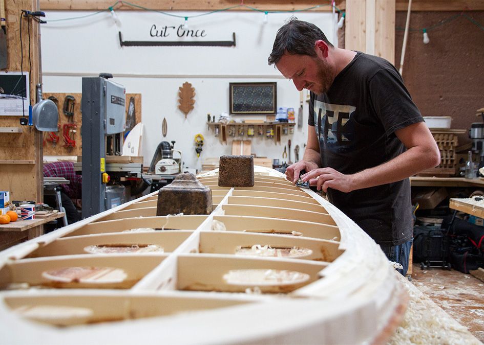 Otter wooden surfboard workshop shaping