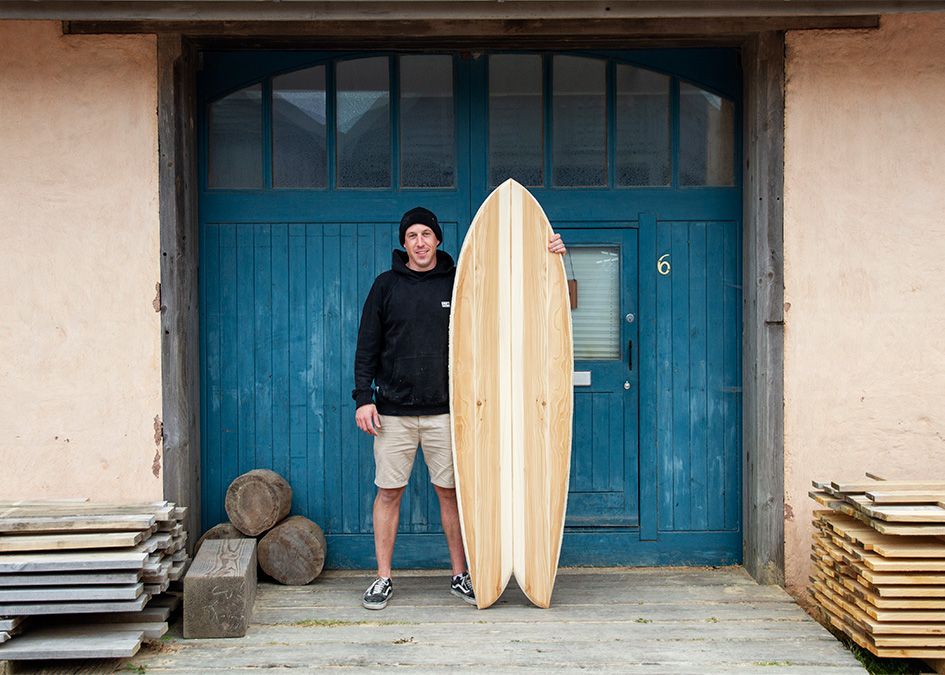 Blue doors otter wooden surfboard workshop woodburner fish