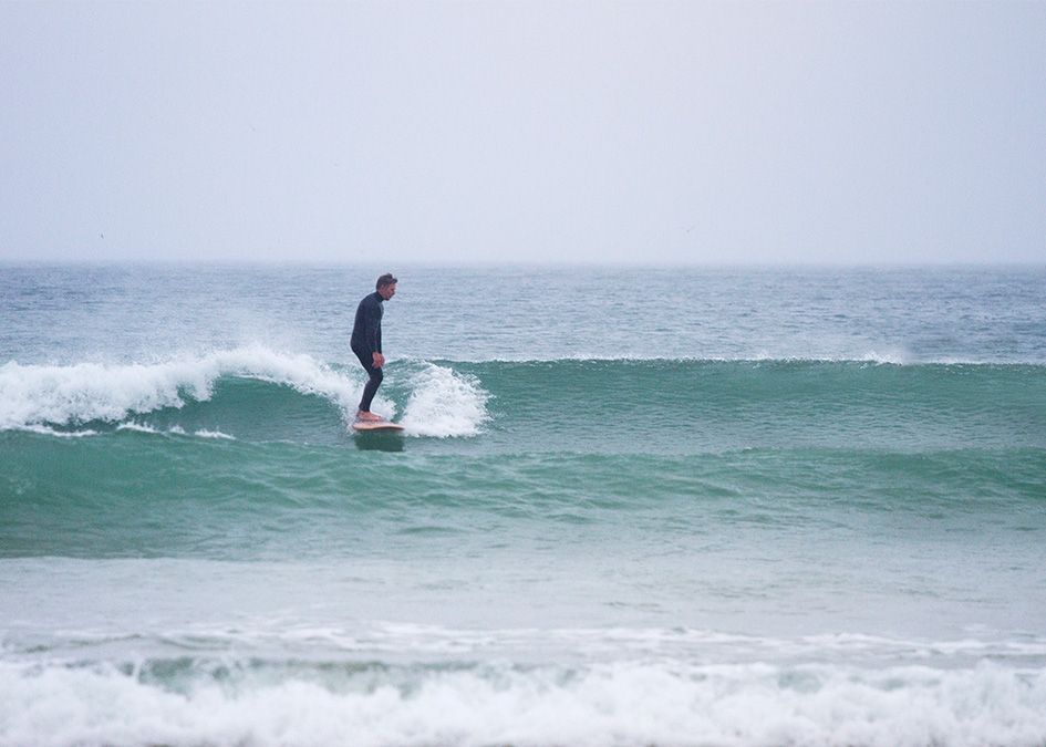 otter wooden surfboard wave surfer