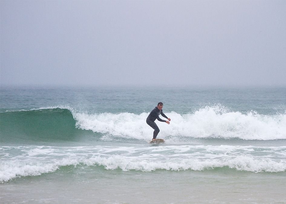 otter wooden surfboard wave surfer