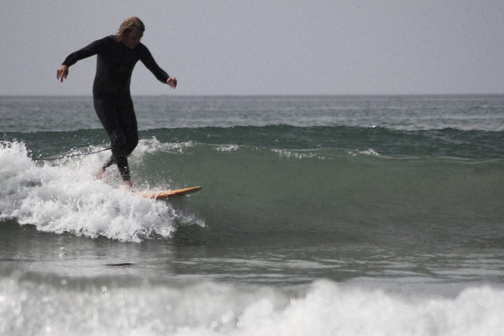 Gideon Wicket otter wooden surfboard perran beach cross-step