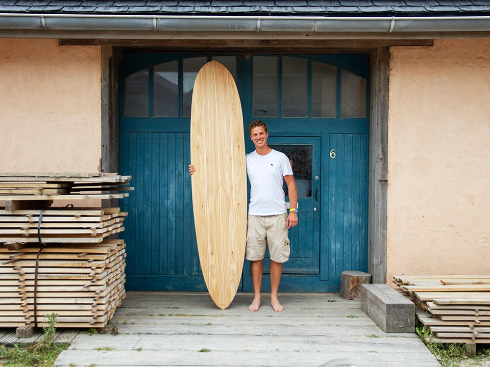 Otter Surfboards Wooden Surfboard Workshop Course Porthtowan Cornwall Guillaume blue doors portrait