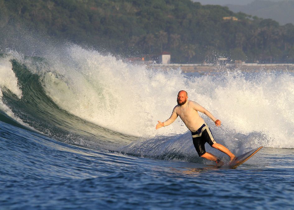 otter wooden surfboard surfer wave