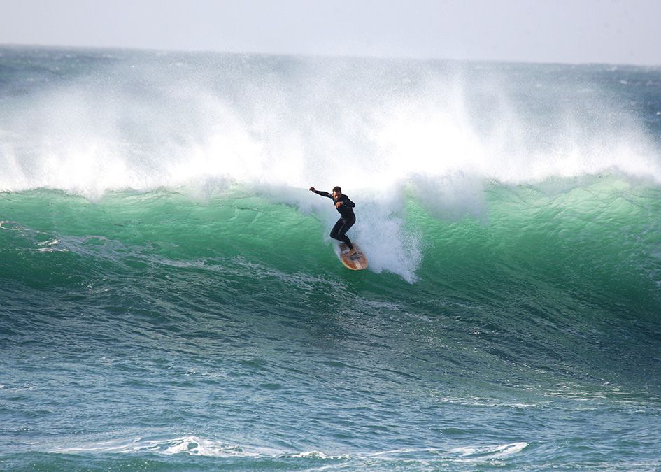Otter wooden surfboard wave surfer