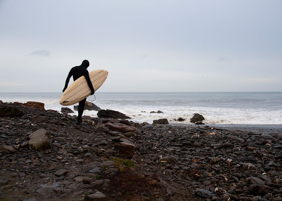 otter wooden surfboards surfer beach