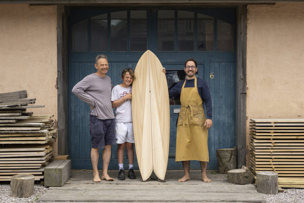 Otter wooden surfboard workshop fish blue doors experience