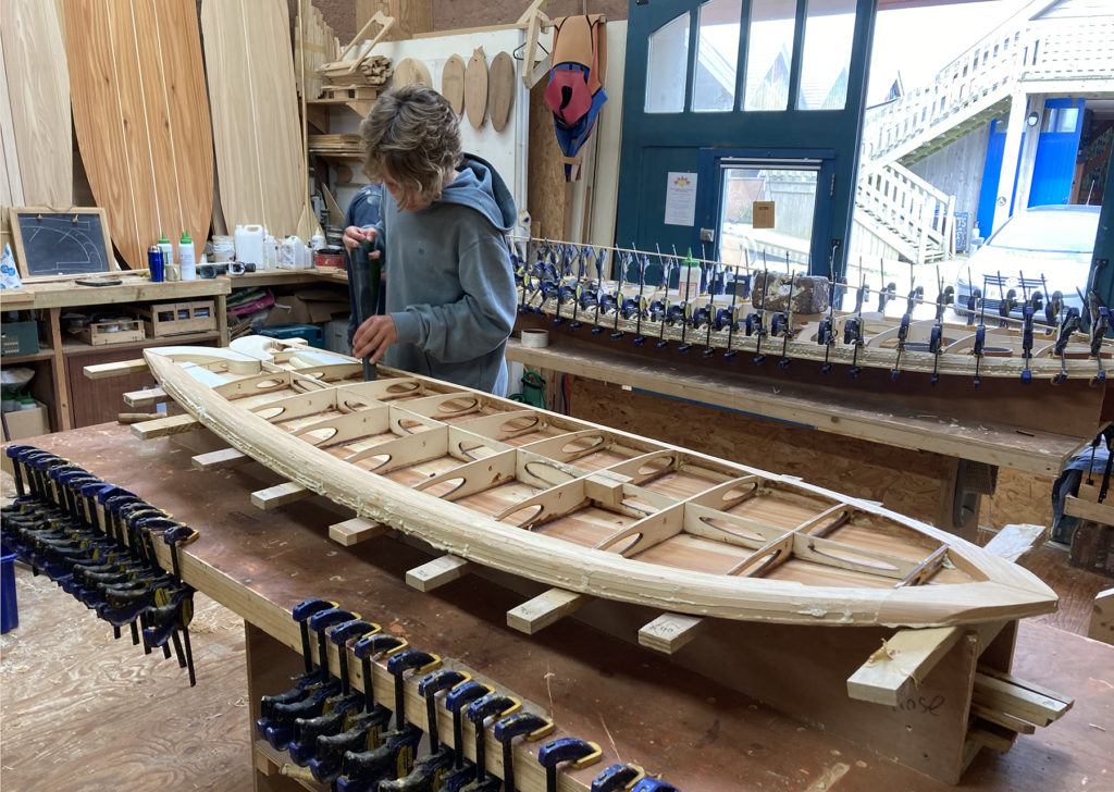 Otter wooden surfboard workshop experience skin and frame fish