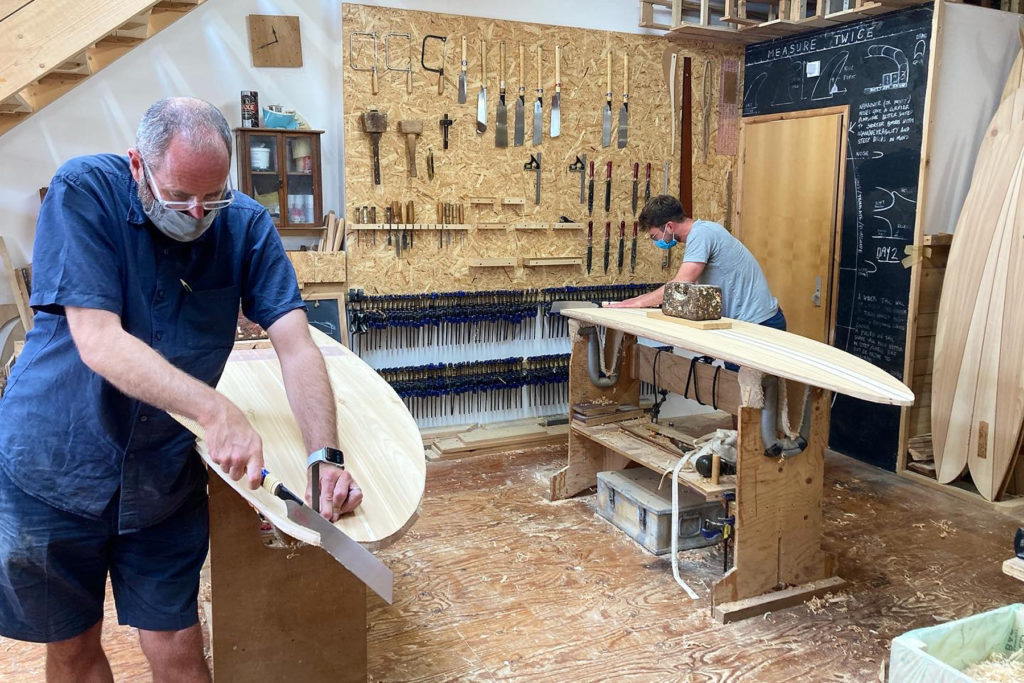 otter wooden surfboard workshop shaping