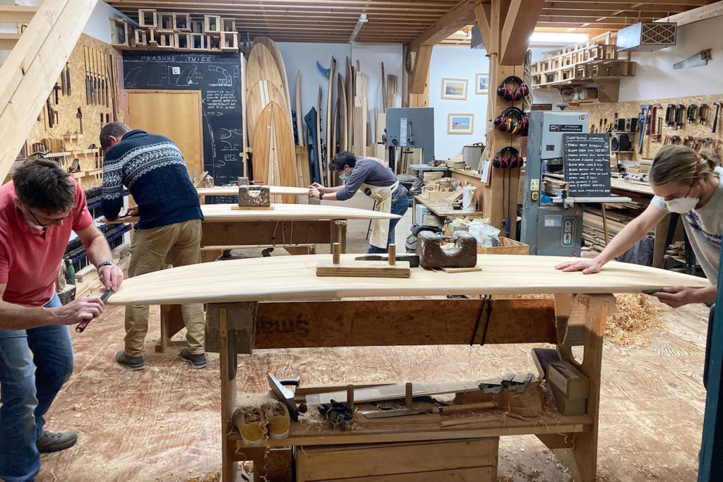 otter wooden surfboard workshop