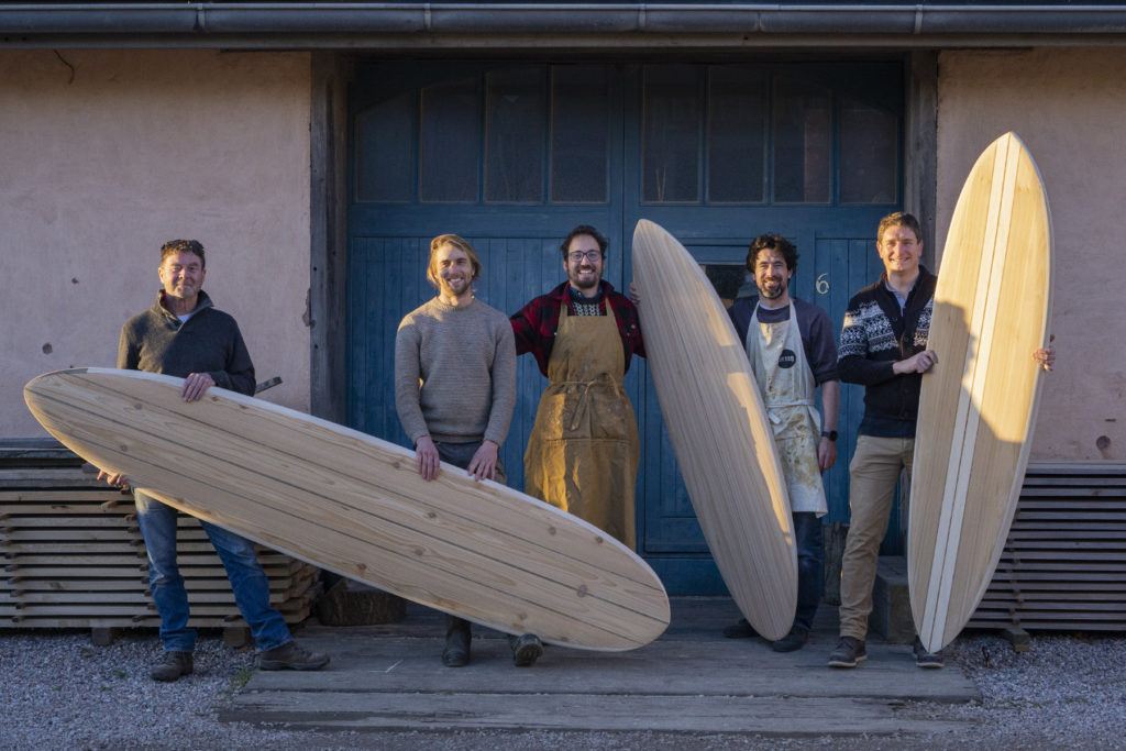 otter surfboards workshop blue doors