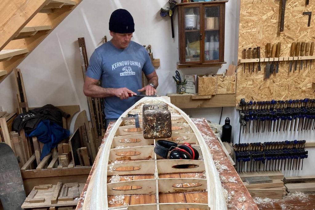 otter wooden surfboard workshop shaping