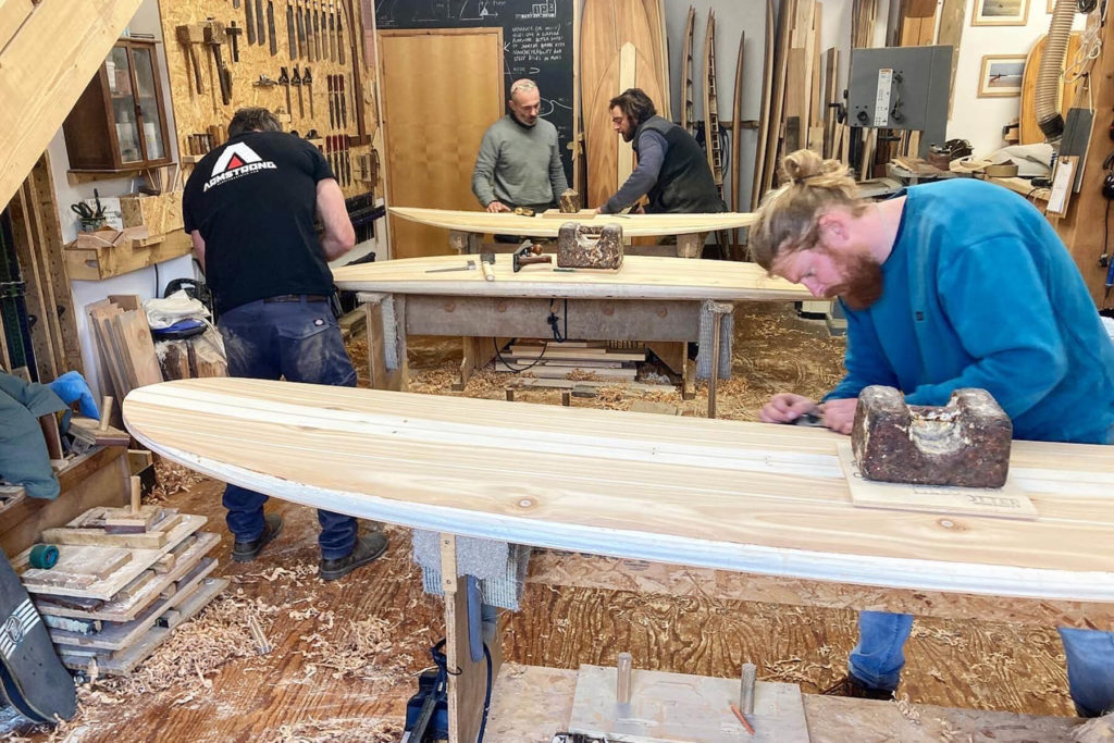 otter wooden surfboard workshop shaping