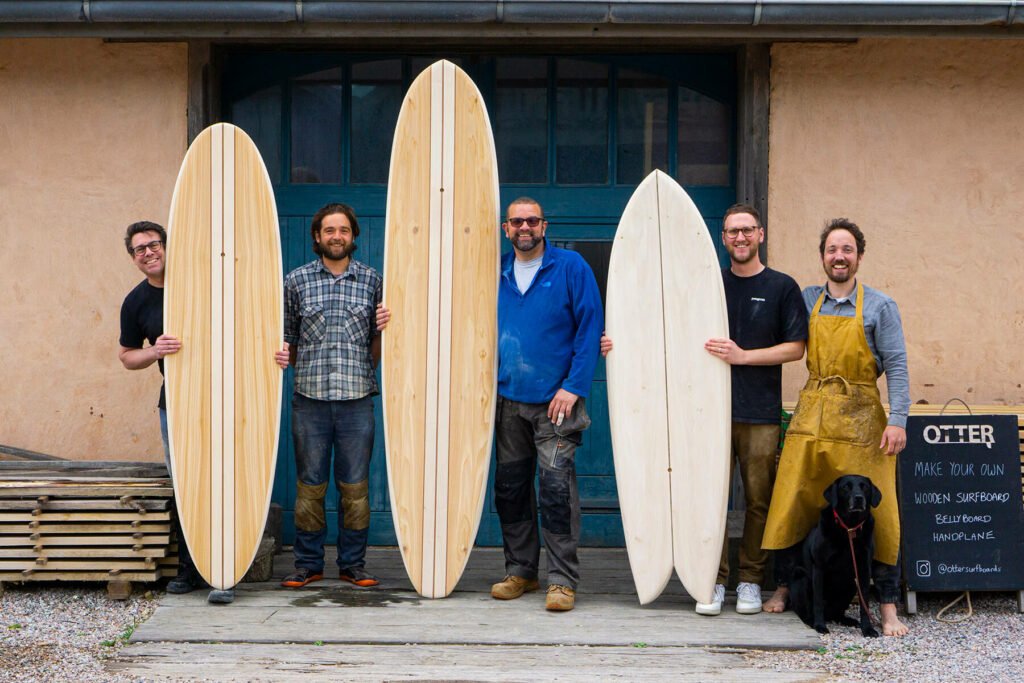 Otter Surfboards wooden surfboard workshop blue doors