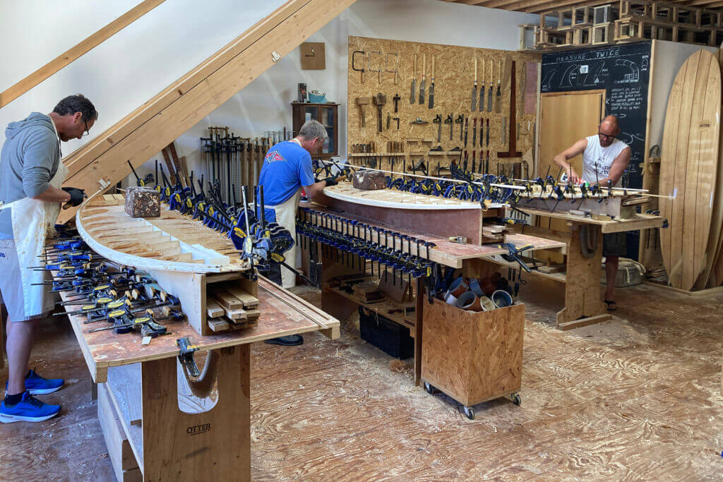 Otter wooden surfboard workshop shaping