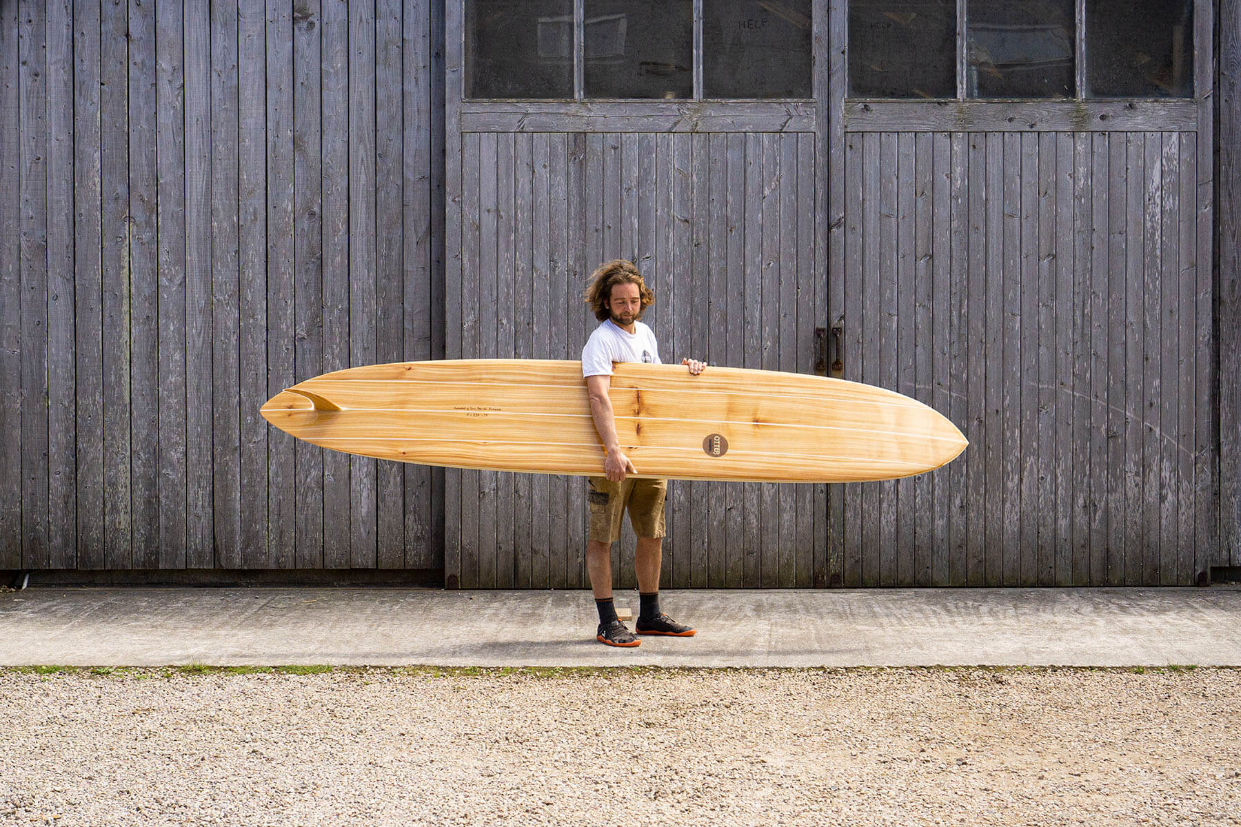 otter wooden surfboard glider birkenstock