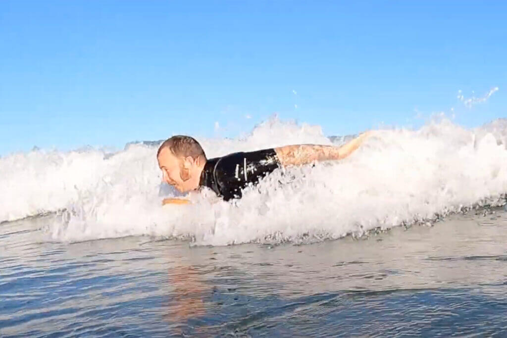 rob bellyboarding otter wooden surfboards