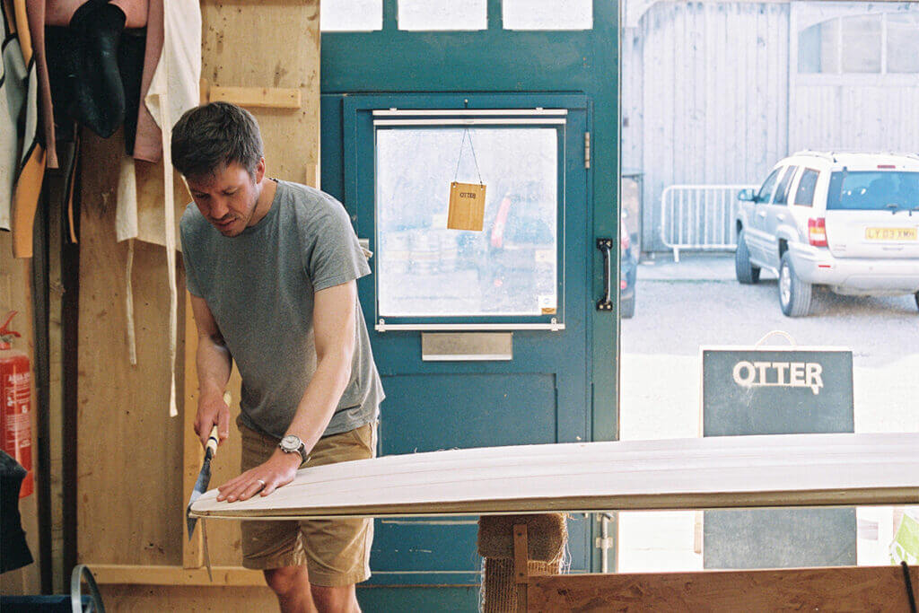 otter wooden surfboard workshop shaping