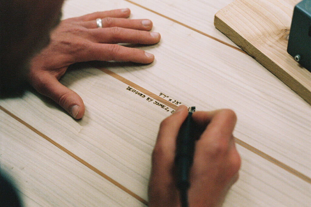otter surfboard workshop signing