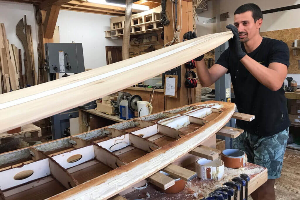 otter wooden surfboard workshop shaping