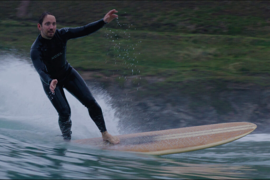 otter wooden surfboard surfing wave pentire drinks