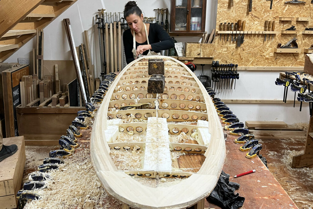 otter wooden surfboard workshop shaping