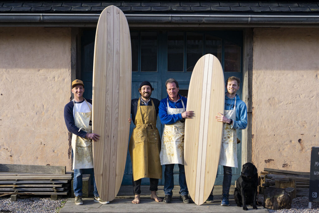 otter wooden surfboards blue doors