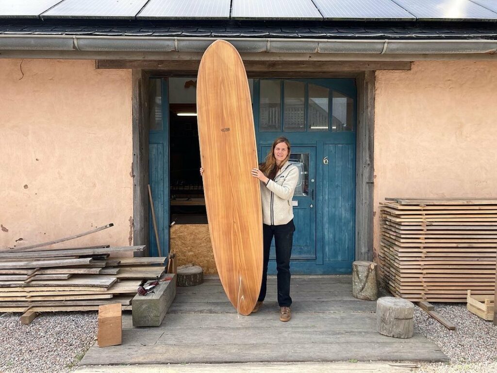 rachel pickup blue doors otter wooden surfboard