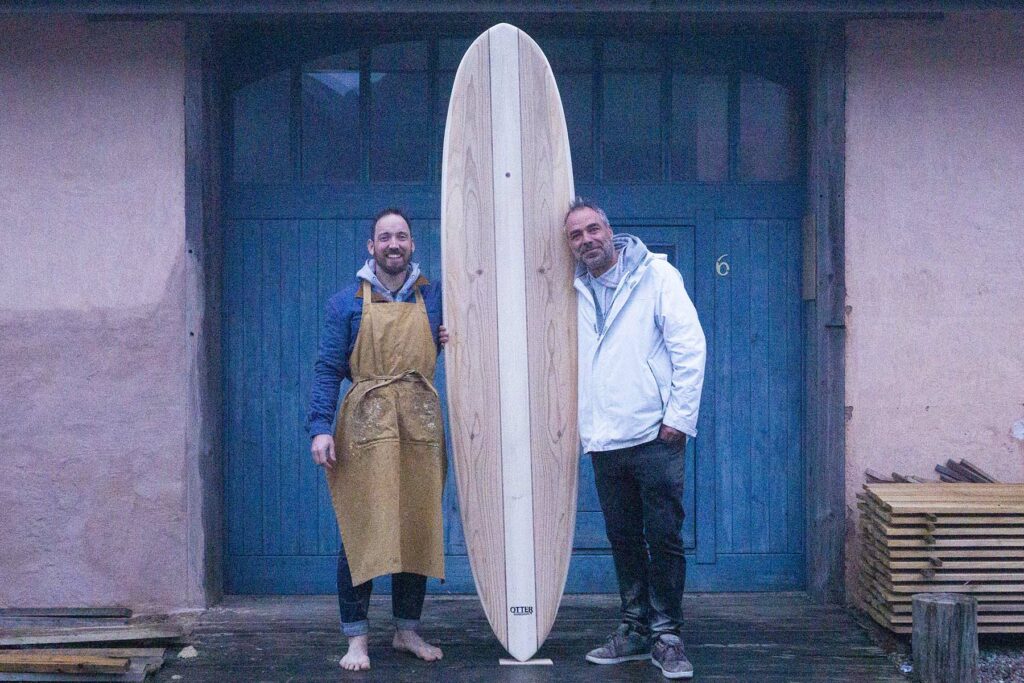 otter wooden surfboard blue doors