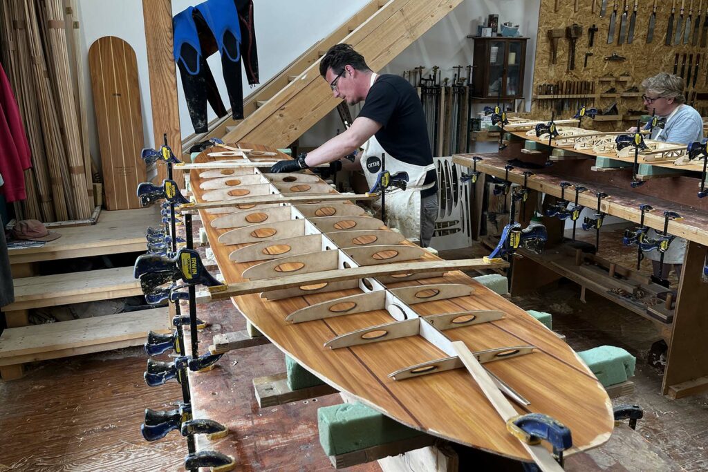 otter wooden surfboards workshop shaping