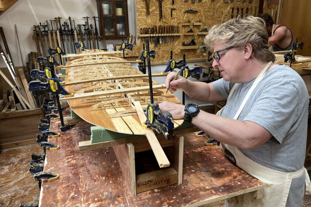 otter wooden surfboards workshop shaping