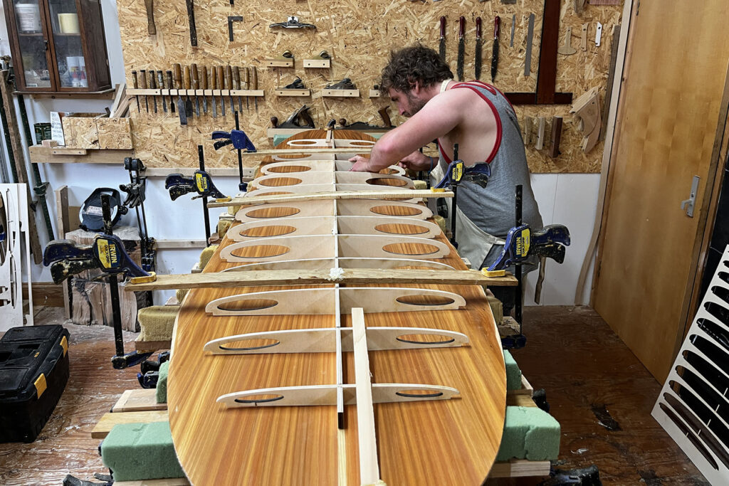 otter wooden surfboards workshop shaping