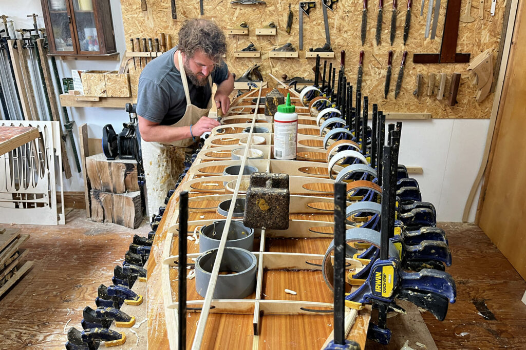 otter wooden surfboards workshop shaping