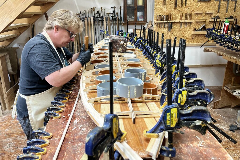 otter wooden surfboards workshop shaping