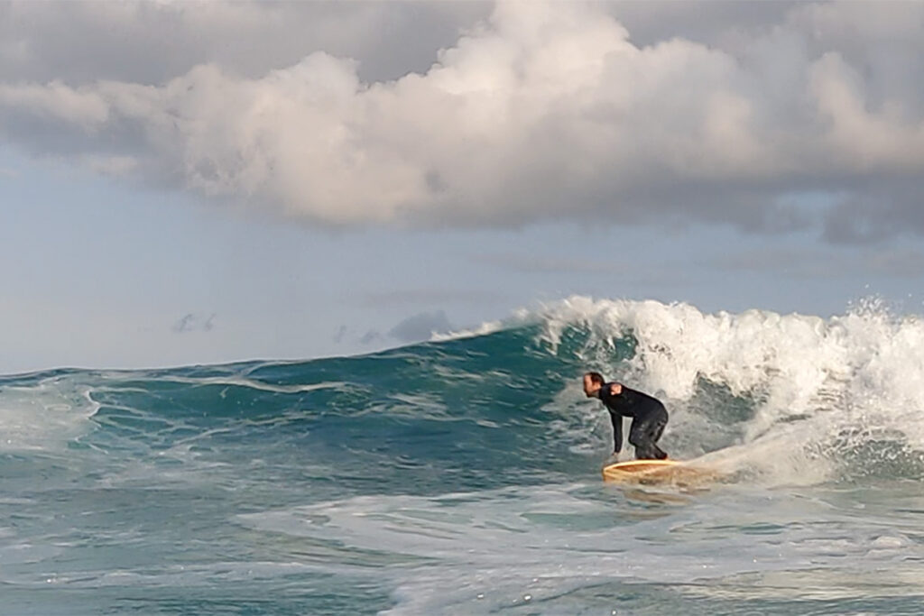 MMSC otter wooden surfboards bottom turn wave surfing
