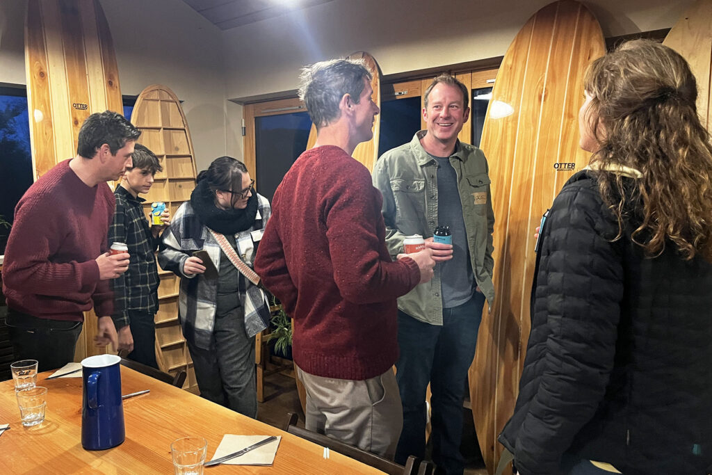 Group looking at boards