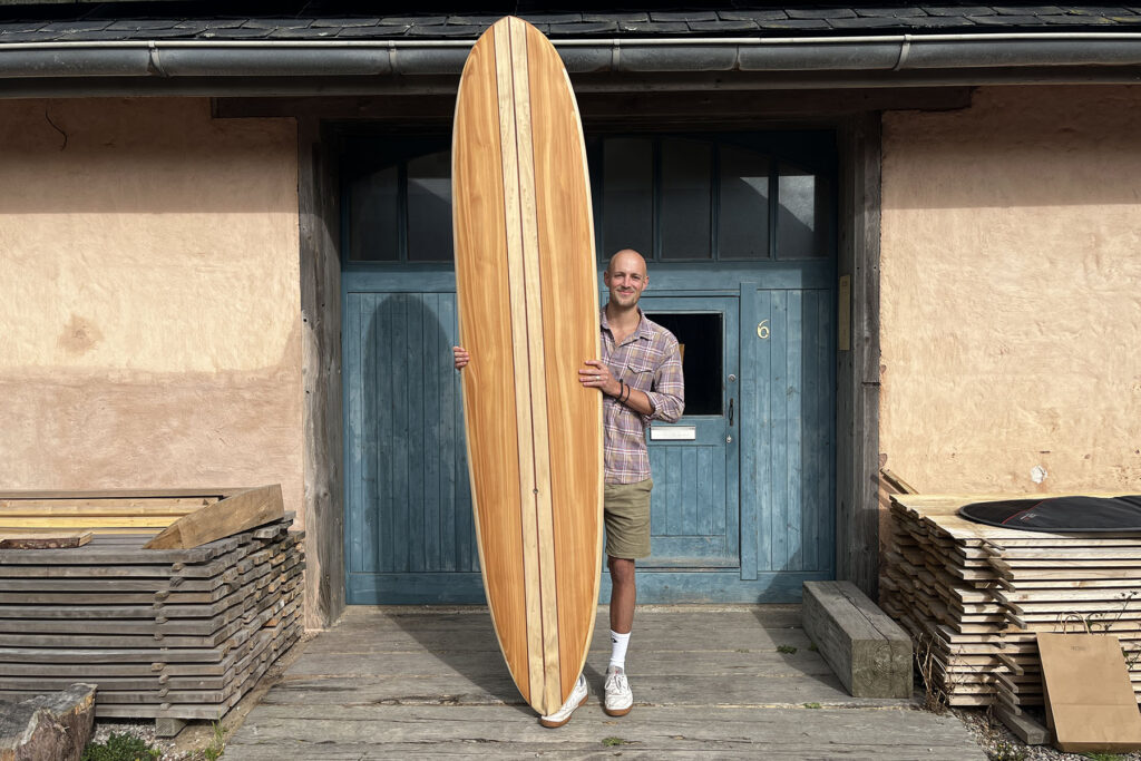 otter wooden surfboards blue doors