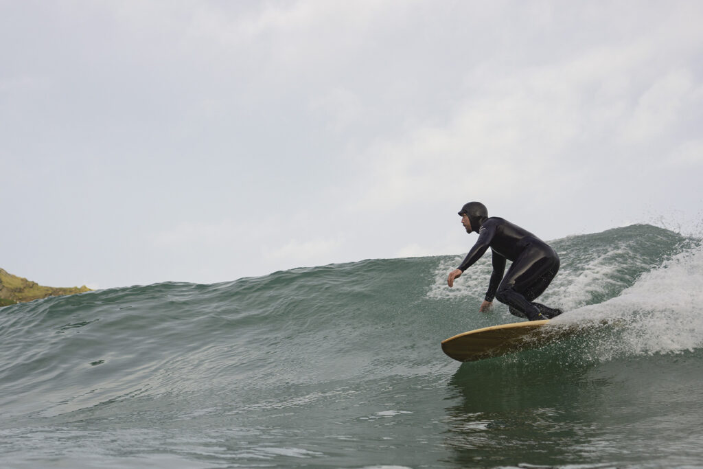 otter wooden surfboards surfer wave turn