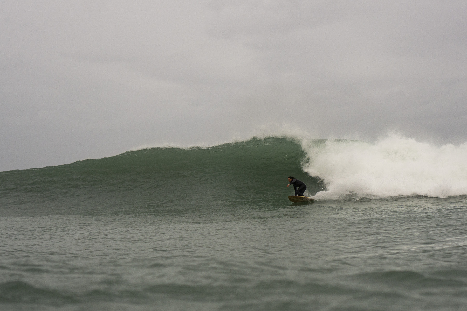otter wooden surfboards surfer wave bottom turn surfing chris