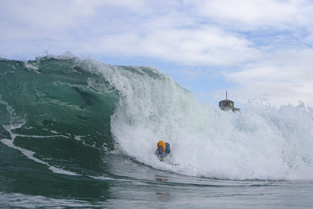 otter bodysurfing handplane wave barrel
