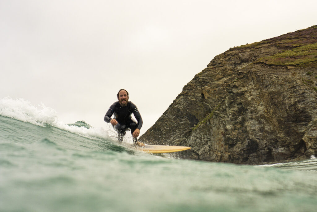 James Otter Wooden Surfboard surfer smiling