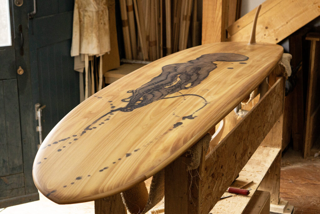 otter wooden surfboard douglas white artwork
