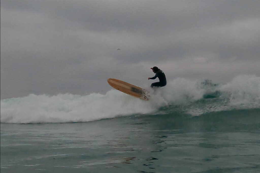 otter wooden surfboard surfer wave longboard floater