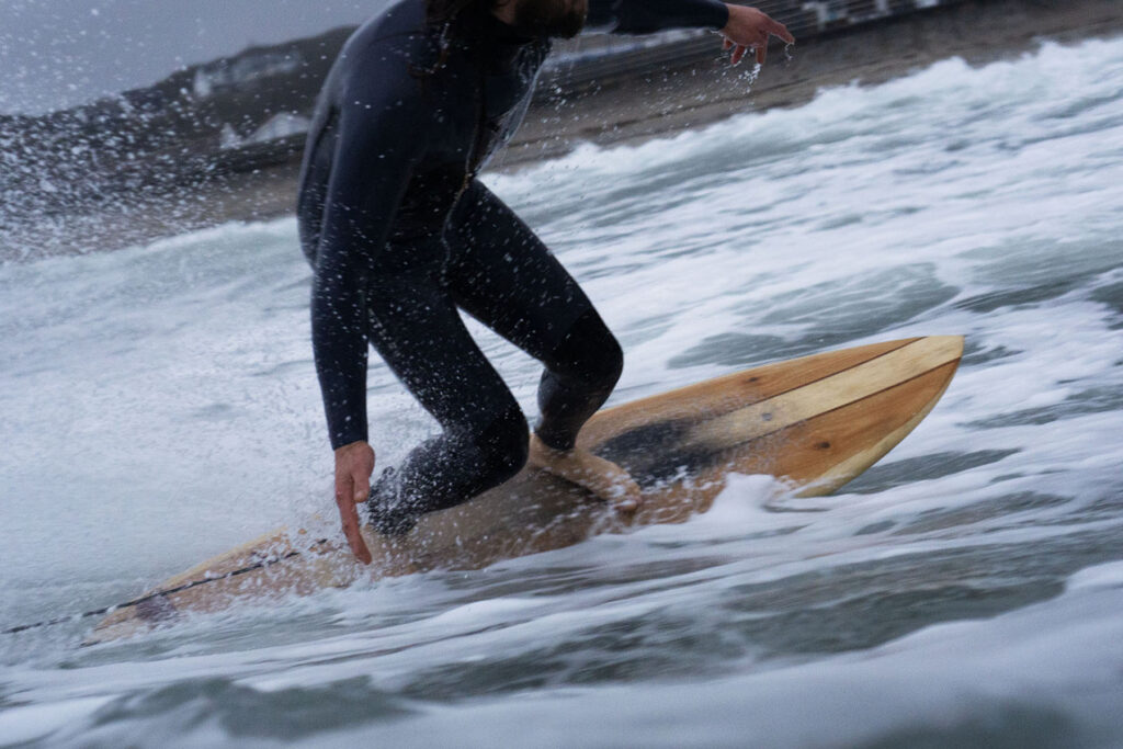 otter wooden surfboards, surfer wave sustainable