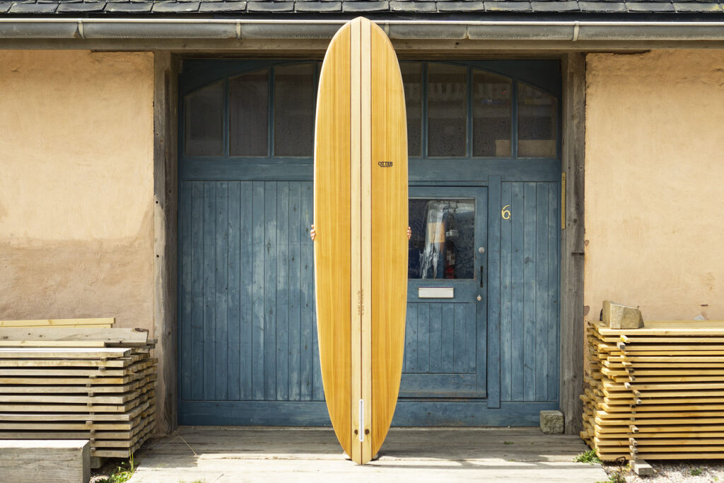 otter sustainable wooden surfboard