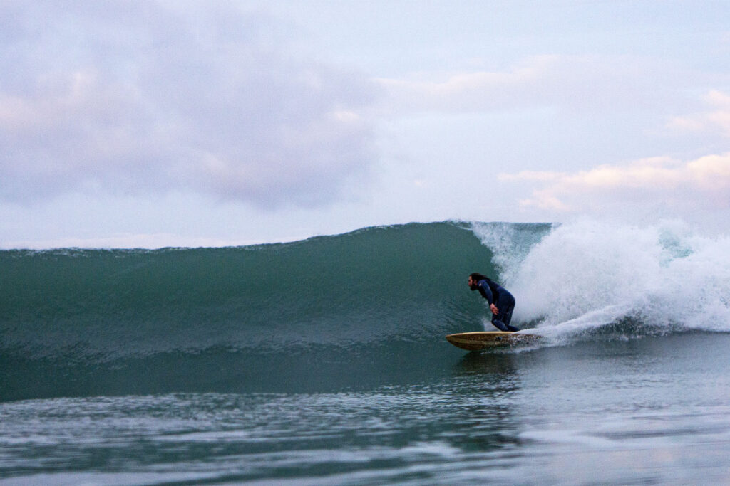 otter wooden surfboards surfer wave sustainable